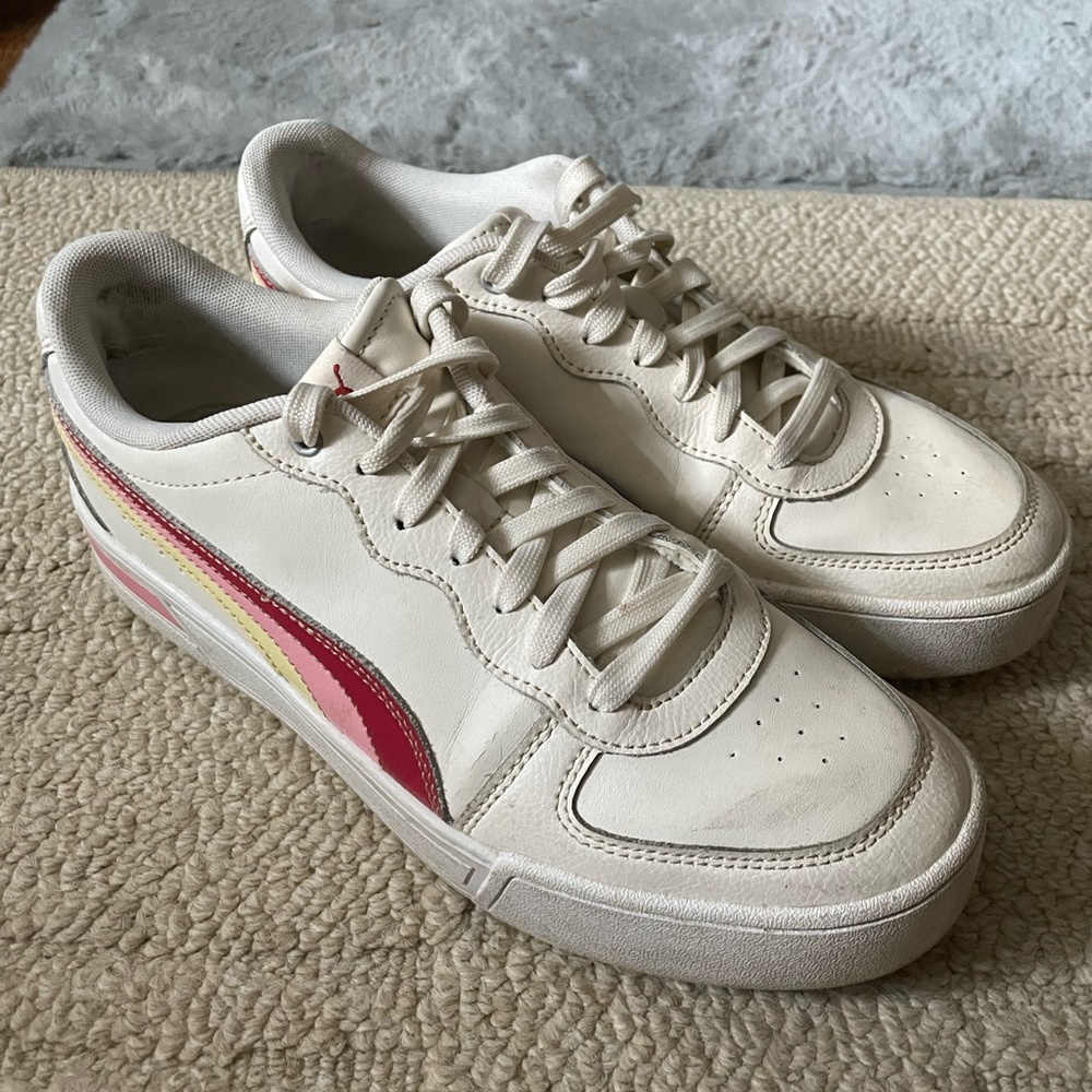 Puma pink and yellow striped sneakers